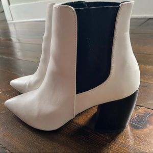 Matte white bootie with black block heels